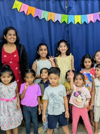 A happy moment from our "Totally Booktastic Club." This picture captures the warm, encouraging environment I foster. Seeing this group of smiling, engaged children after a storytelling session is a perfect snapshot of the community we are building.