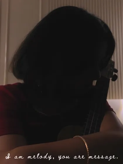 A silhouette shot from the 'Svarakshara' music video with the line "I am melody, you are message." This single image captures the entire concept of the song and my approach to collaboration.