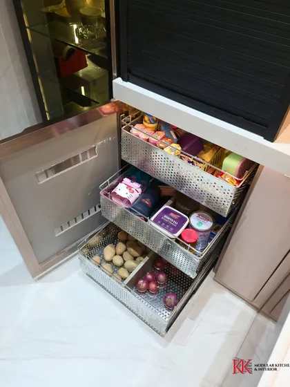 A closer look at the metallic wicker baskets in our Kalpataru Heights project. These drawers are perfect for storing onions and potatoes, keeping them fresh and neatly organized.