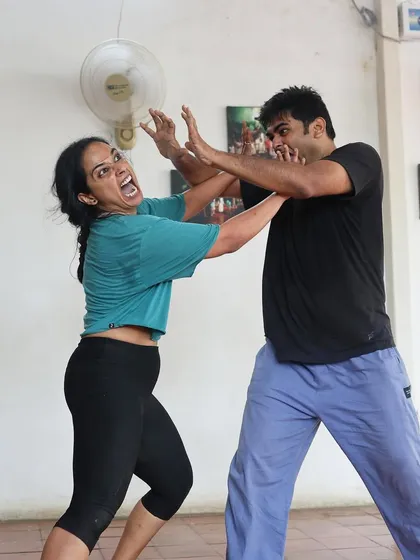 A moment of physical comedy during a "Gretel" rehearsal.