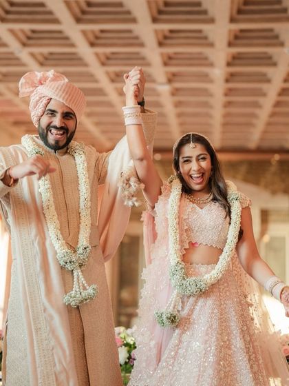 The newly married couple makes their exit, their faces beaming with joy and excitement for their new life together.