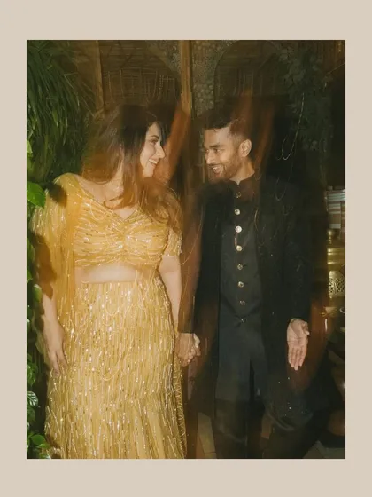 A motion-blur portrait of Juhi and Jay. This artistic effect adds a dreamy and dynamic quality to the image, capturing the energy of their celebration.