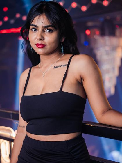 A guest posing on the balcony.