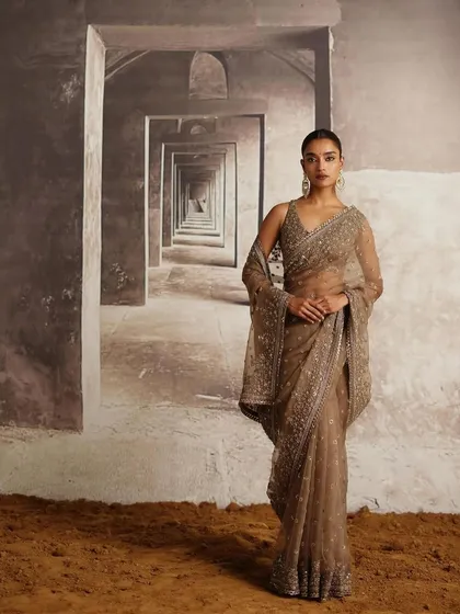 A full-length shot of a beautiful sequined saree from the AR by Rhea Kapoor campaign. This is a glamorous and sophisticated option for a reception.