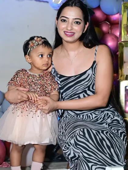 A happy mother and child at the tropical-themed party in Indiranagar. We create stunning backdrops for these precious, picture-perfect moments.