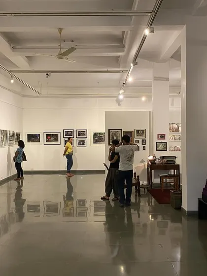 A full view of the gallery, showing the mix of installations and wall-hung art.