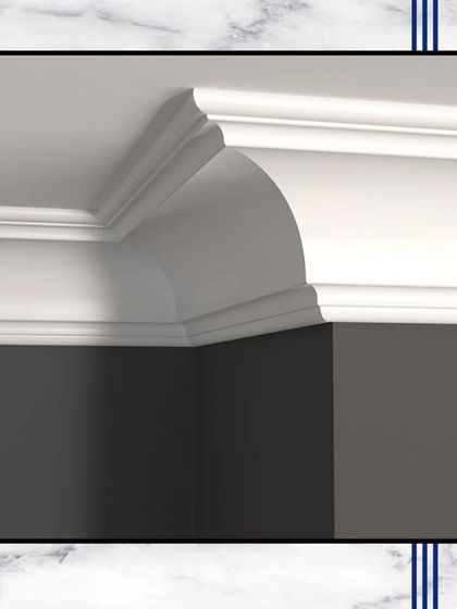 A close-up of our intricate crown molding. This is a small detail that makes a huge difference, adding a finished, architectural touch that bridges the wall and ceiling.