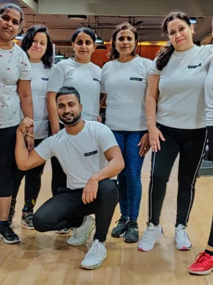 This is our crew, our fitness family. I believe in the power of working out together, and this picture captures the supportive and strong community we have built. We motivate each other to reach our goals.
