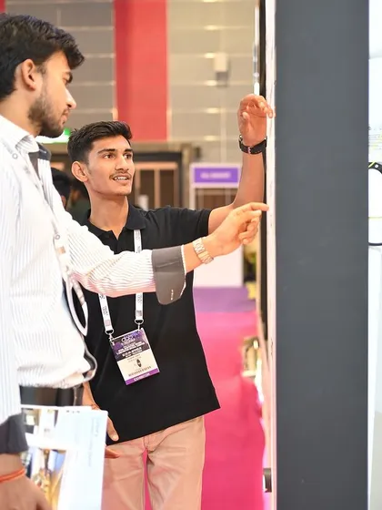 Our team members are experts in their field, always ready to provide a hands-on demonstration. Here, we are showcasing the functionality and design of our integrated systems to an interested client.