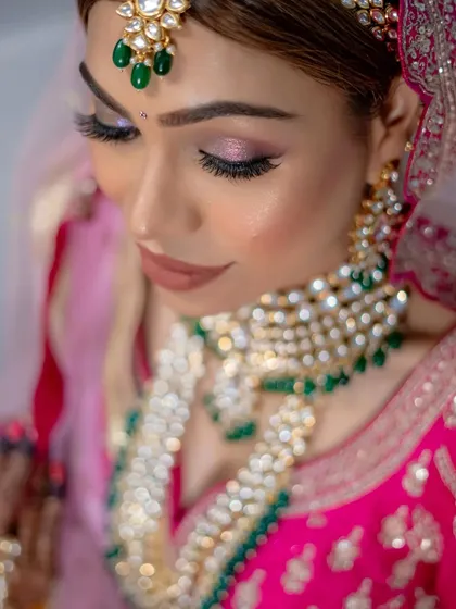 Let's talk about my signature holographic bridal eyes. This close-up shows how I layer subtle shimmers and light-catching pigments to create a multi-dimensional effect that looks magical in person and in photos, without being overpowering.