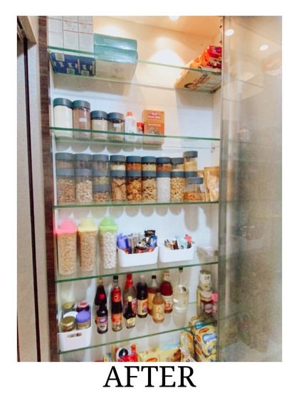 After: A pantry cabinet transformed for Diwali. With everything decanted into jars and sorted into baskets, this kitchen is ready for festive cooking and hosting.
