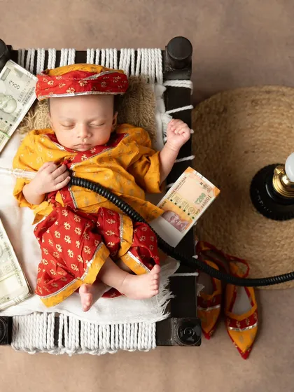 Our little Rajasthani prince counting his earnings after a long day.