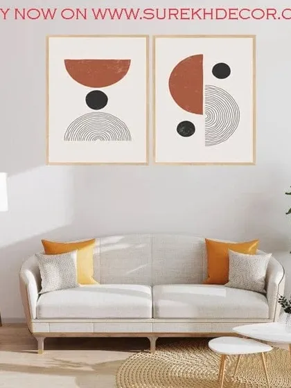 This set of two framed art prints features bowed, abstract shapes in a warm, earthy palette. The combination of solid colors and line work creates a balanced and modern composition.