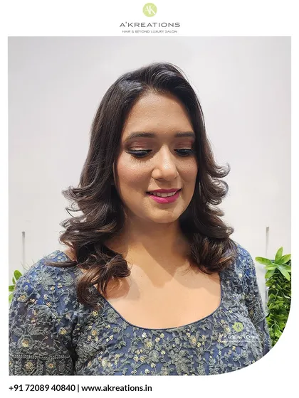 A full view of the finished hair and makeup, showcasing a radiant and confident client ready for her event.