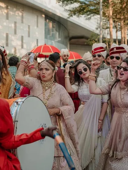 The ladies of the family showing how it's done! The Baraat is a celebration for everyone, and I make sure the atmosphere is inclusive and full of energy.