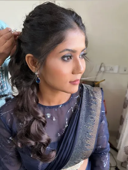 Another angle of the blue smokey eye look, perfect for an evening event.