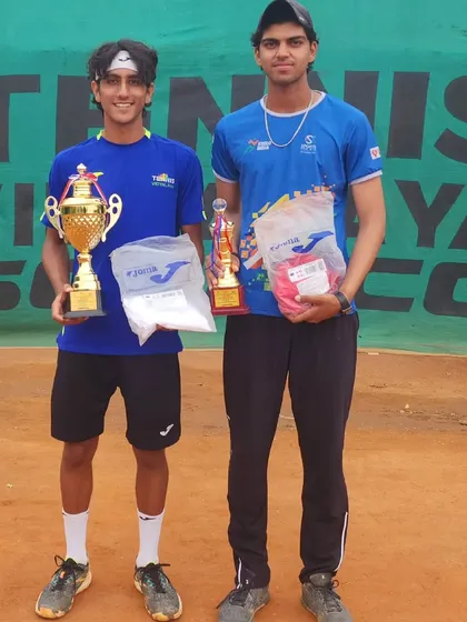 The winner and runner-up of the boys' singles at the 4th Shri Rajesh Patel Memorial Super-Series AITA Tennis Tournament.