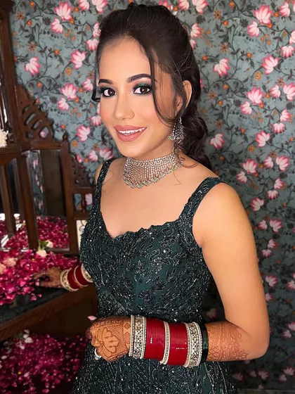 Another shot of this lovely reception bride. Her smile shows how confident and beautiful she felt in her final look.