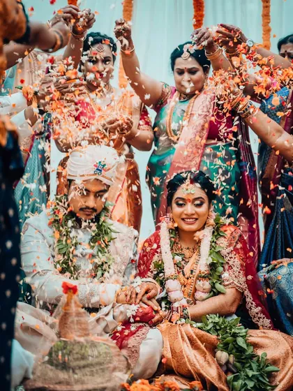 The pure, uncontainable joy of a wedding ceremony, surrounded by the blessings of family. We live for these moments of happy chaos, capturing the collective celebration that makes your day so special.