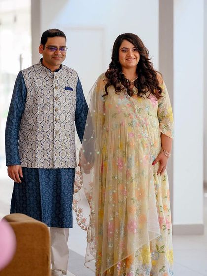 A candid walking shot of the couple. Movement adds a natural and dynamic feel to the portraits, making them feel less posed and more authentic.