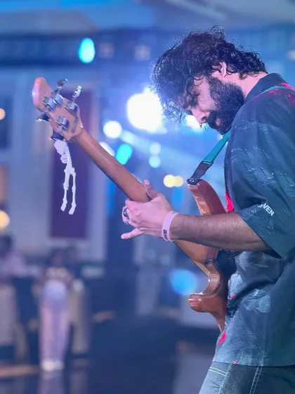 Our bassist lost in the music during a performance at the ITC Maratha for a corporate reunion. Even in a formal setting, we bring the rockstar energy.