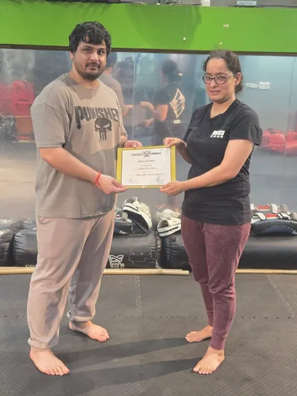 Another one of our "girl bosses" receiving her certificate. I am proud to train strong, capable women.