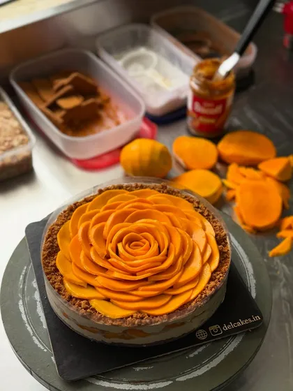 This is how we prepare my Mango Biscoff Cheesecake, with a beautiful rose made from fresh Alphonso mango slices. I love how the sweetness of the mango works with the spiced Biscoff flavour. It’s a seasonal favourite for a reason.