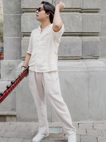 A full-length shot showing the complete outfit and vibe of the "Bones" video.