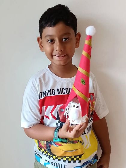 This student is all smiles with his completed Santa Gnome, ready for the holidays.