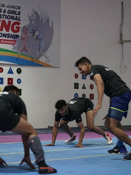 A game of 'tag' on the mat. These activities serve as a dynamic warm-up and a great team-building exercise.