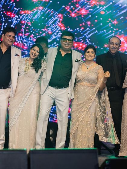 The whole family together on stage for a final pose. A perfect end to a series of amazing performances.