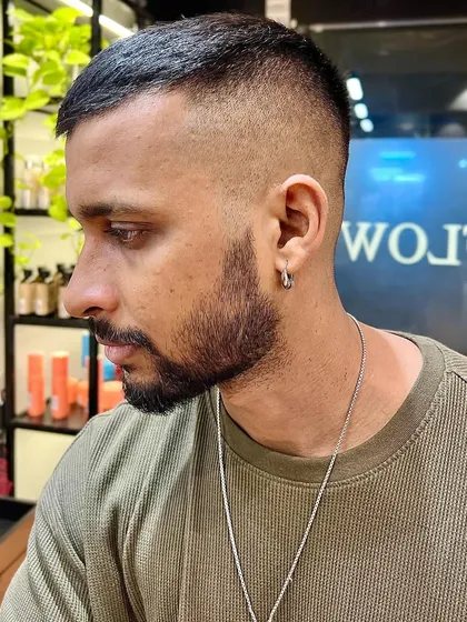 Another angle of the sharp skin fade, showing the clean lines and seamless blend.