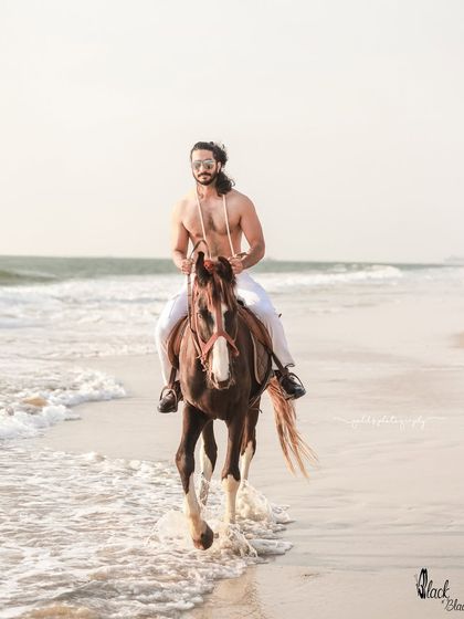 An extensive editorial series of a male model with a horse on the beach. I used a mix of color and black and white, along with varied poses, to create a powerful narrative of untamed strength and freedom.