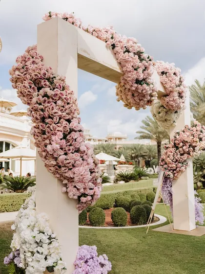 A stunning floral arch at a Dubai wedding. This image is part of a series showcasing how I transform venues into timeless, elegant spaces.