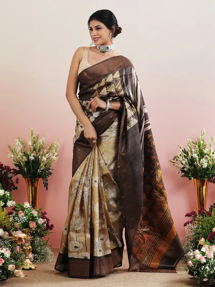 The full view of the brown and beige printed saree, a sophisticated and modern choice.