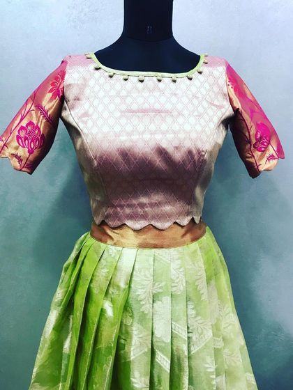 This set was created from a printed saree. I designed a simple blouse with a contrasting border and a pleated skirt to create a fresh, new ethnic outfit.