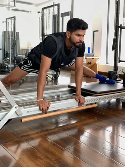 A glimpse from a rigorous session with cricketer Shreyas Iyer. This stretch on the Reformer is crucial for improving hip mobility and flexibility, essential for agile movements on the field.