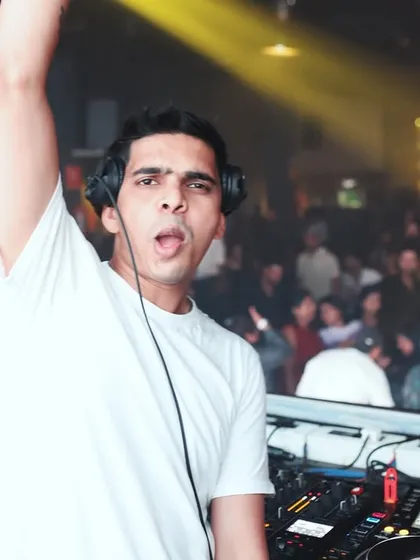 Hyping up the crowd, with the whole dance floor visible behind me.