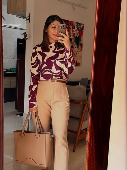 What's your personal style? It's not about chasing trends. This mirror selfie in a printed top and tailored trousers is an example of my own classic-yet-modern style.