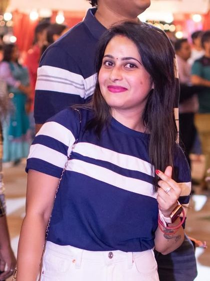 A stylish partygoer enjoying the music.