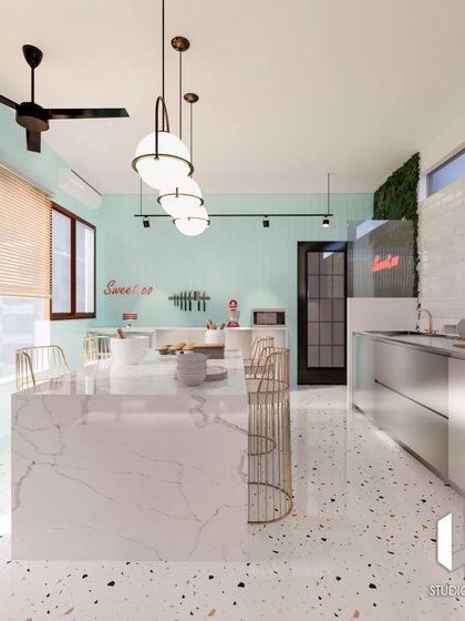 For this baking studio concept, I used a fresh palette of mint, terrazzo, and marble. The waterfall island bench is the centerpiece, illuminated by gold-accented pendant lights. A green wall at the entrance adds a pop of life and color, playing off the whites and grays of the space.