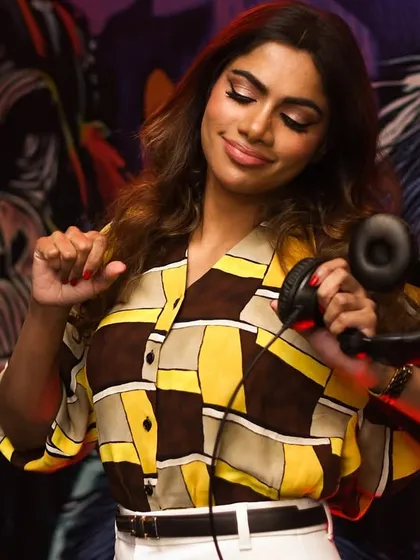 A stylish shot of me with my headphones, feeling the groove of the music.