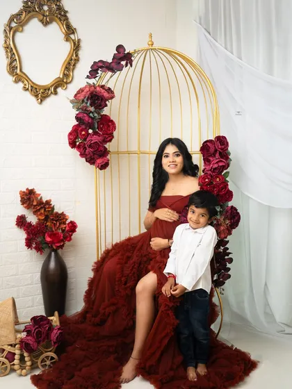 Welcoming a new baby is a family affair. I always encourage older siblings to join in, capturing the sweet bond between a mother and her child as they wait for the newest family member.