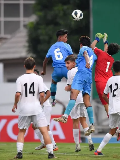 An action shot from an Indian U17 match, showcasing the physicality and aerial ability we work to develop.