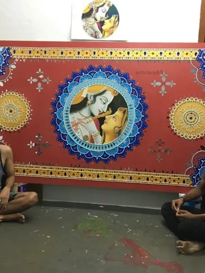 Our team proudly sitting with the completed Radha-Krishna panel before its delivery and installation. We take great pride in our handiwork and in delivering large, complex projects on time for our clients.