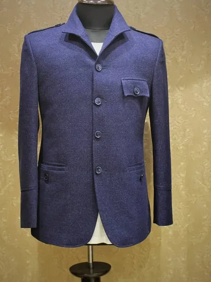 A glimpse of our suede blazer collection. This navy blue Jodhpuri or safari-style blazer is a versatile piece that can be dressed up for a formal event or worn for a smart-casual look.