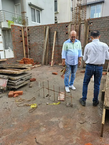 Placing energized crystals at the foundation of a new home. This is part of my Energy Vastu process to lock in positive vibrations from the very start.