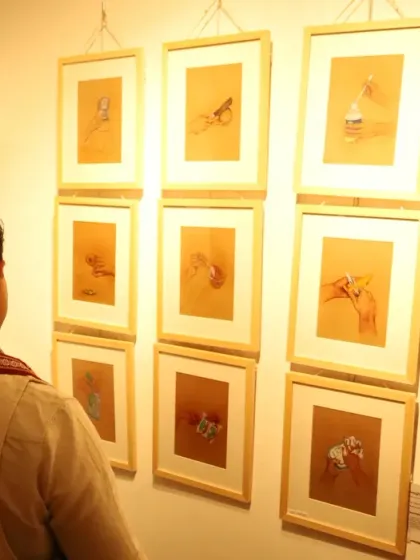 A moment from my exhibition at the IIWC Art Gallery. It is always a pleasure to see people connect with my work and to share the stories behind each piece.