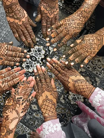 It's always fun to do henna for the entire bridal party. Here is a group shot showcasing a variety of guest and party mehndi designs, each one unique to the person wearing it.