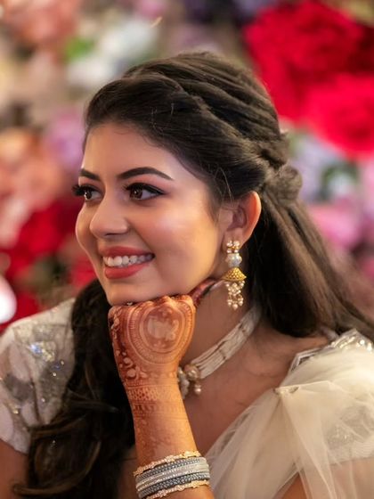 A candid moment of pure joy. This photo shows how my makeup is designed to look beautiful not just in portraits, but in the happy, unposed moments of your celebration.